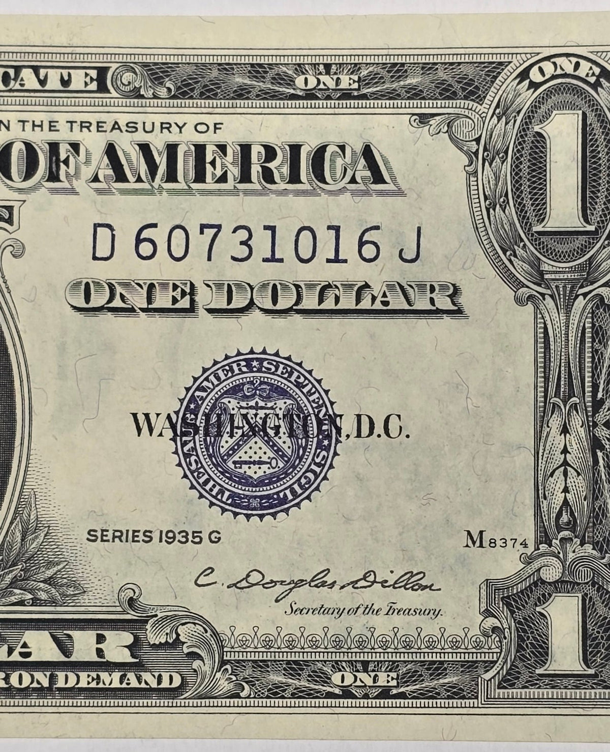 1935G $1 Silver Certificate Blue Seal, WITH MOTTO (016J) - Crisp Uncirculated